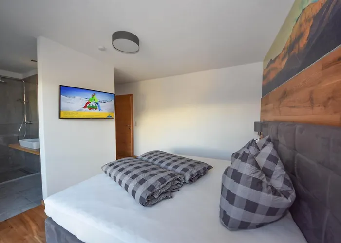 Alpenzeit Ferienhaus *